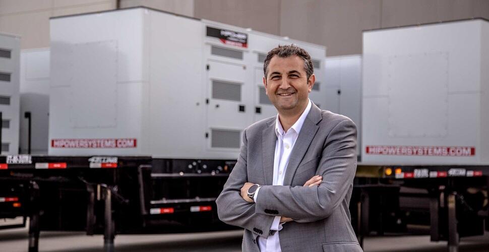 Rino Sbriglia stands in front of HiPower Generators powered by Volvo Penta